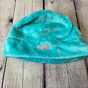 The North Face furry snow hat med light turquoise